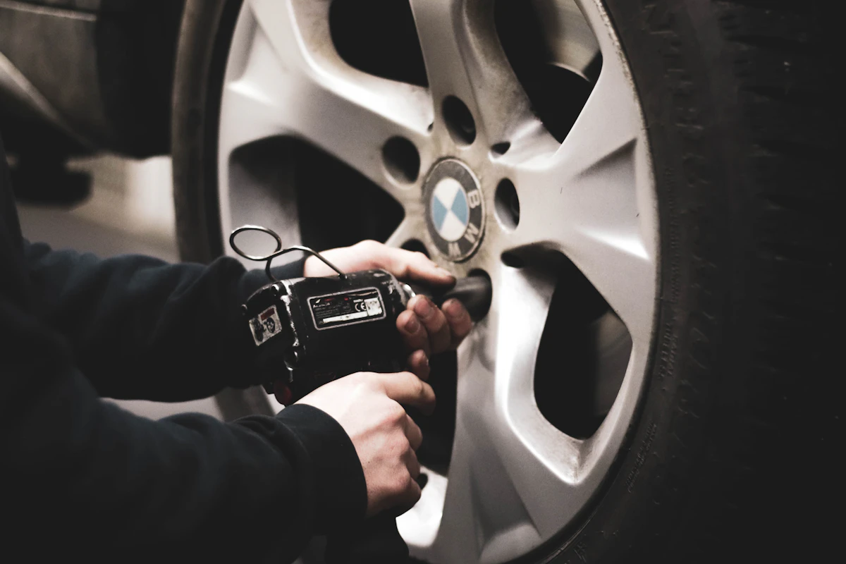 Clean automotive repair shop service bay with mechanic lift equipment