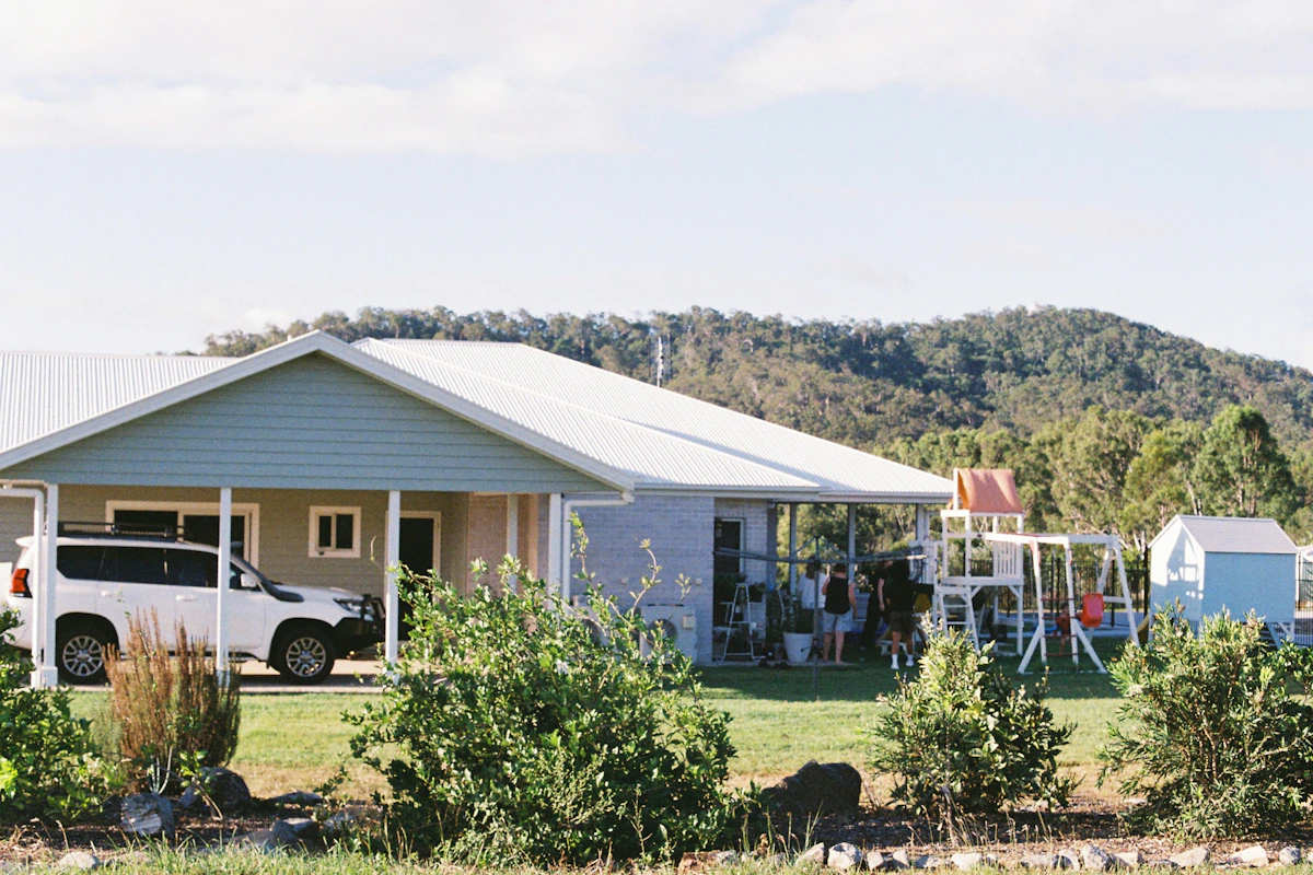 Suburban single family home with driveway and family vehicle